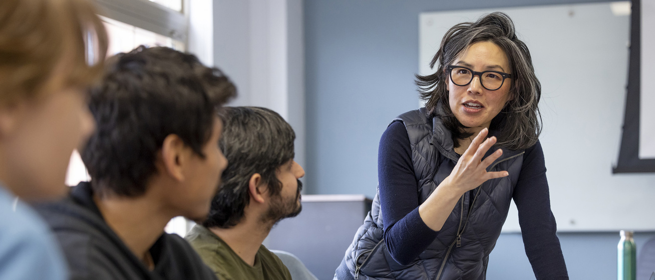 Professor Freda Lynn interacting with students in her Sociology class